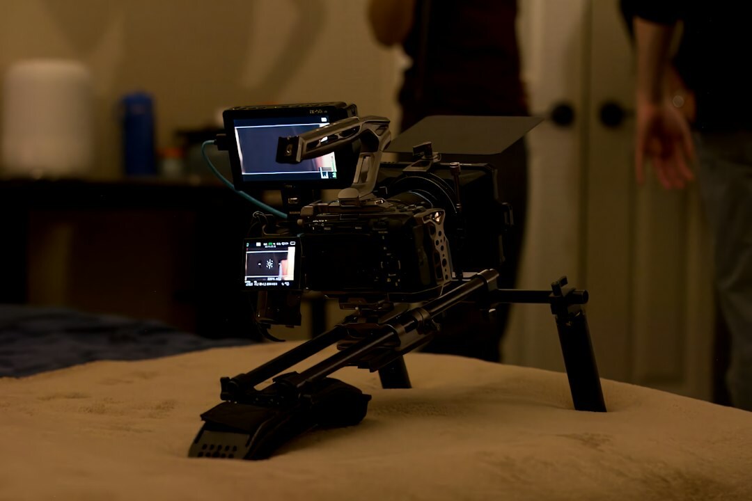 Camera crane operating over television studio set
